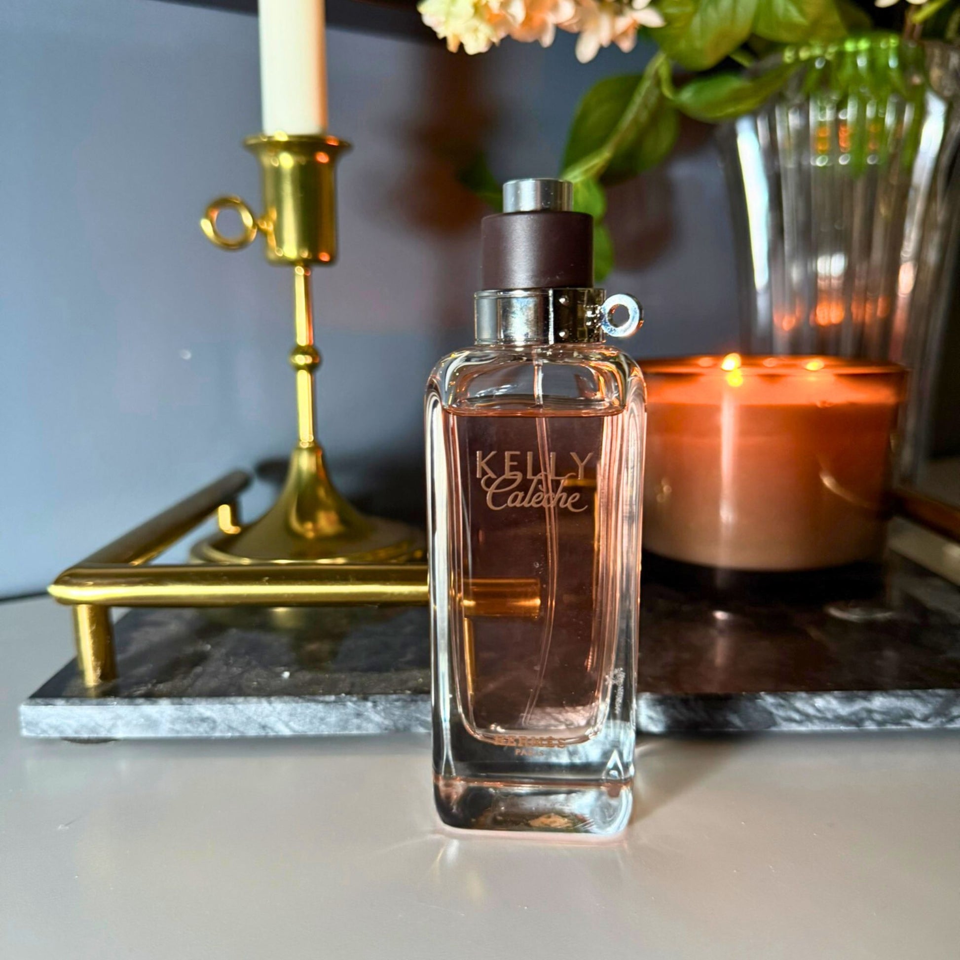 Hermès Kelly Calèche luxury perfume decant styled lifestyle photo – authentic at FragraDiva