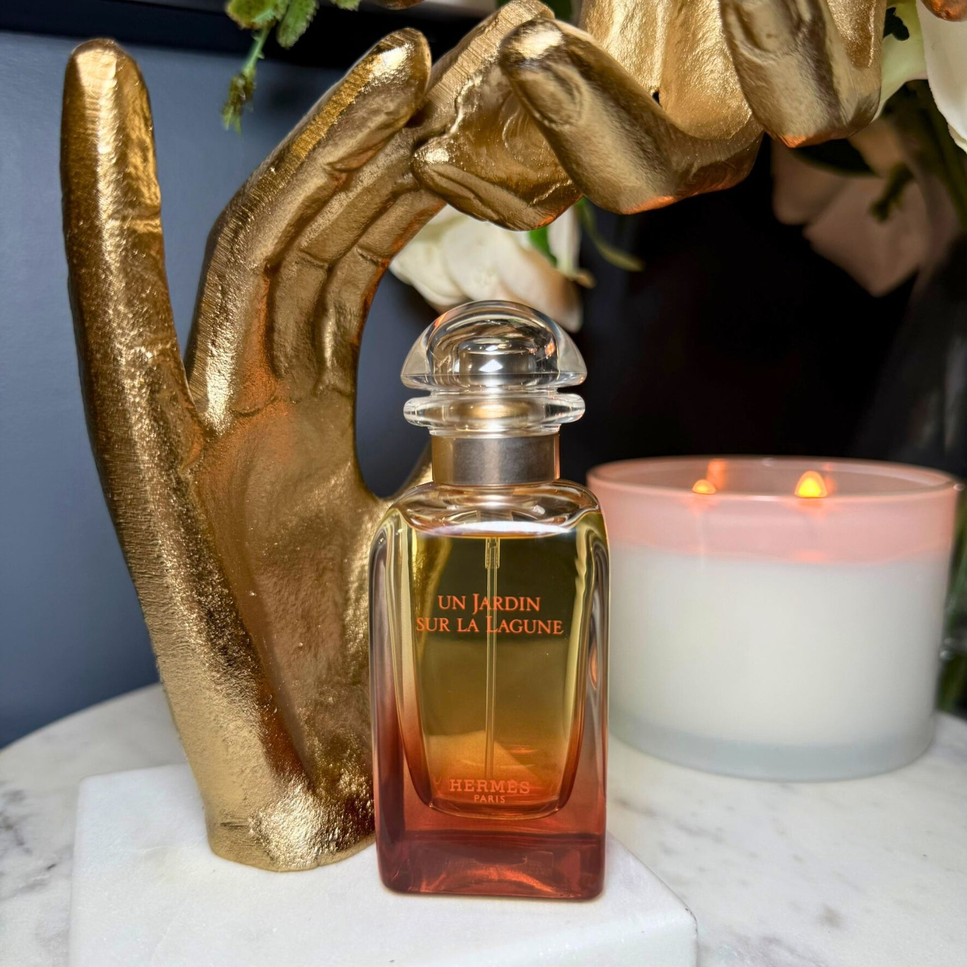 Hermès Un Jardin sur la Lagune luxury perfume decant styled lifestyle photo – authentic at FragraDiva