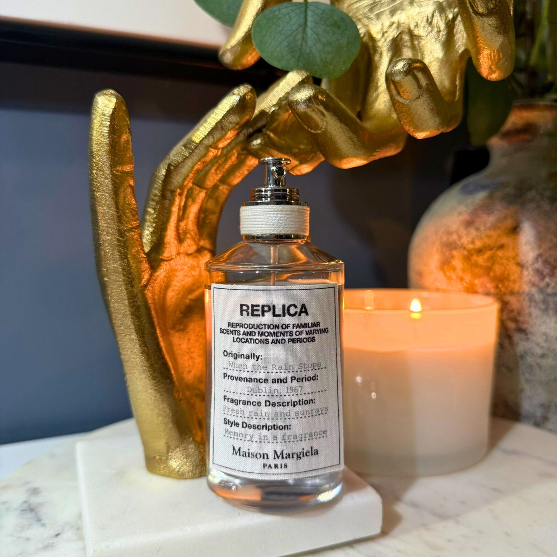 Maison Margiela When the Rain Stops luxury perfume decant styled lifestyle photo – authentic at FragraDiva